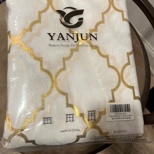 Gold and white sheer curtain